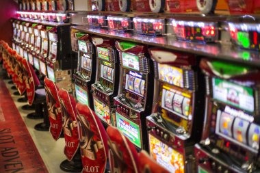 ganas mobile app interface showing slot games and sportsbook markets